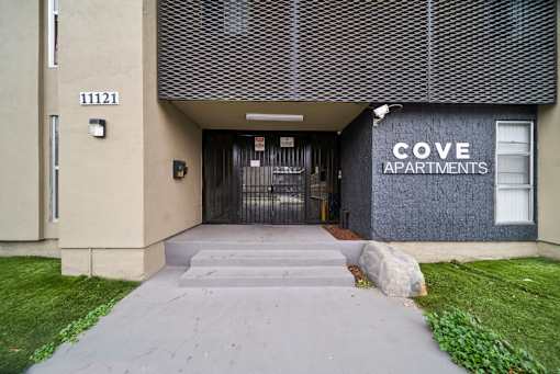 The front of a building with the number 11121 on it.