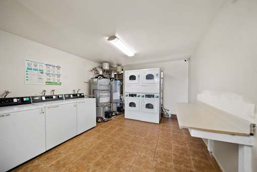 A laundry room with a washer and dryer.