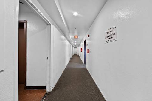 A long hallway with a sign that says "Lobby Office".