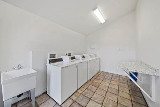 A laundry room with a washer and dryer.