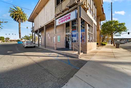 A liquor store with a sign that says "Back Liquor".