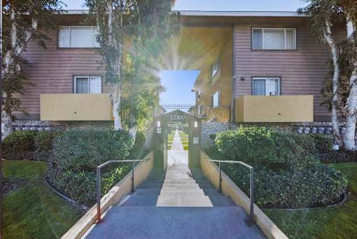 A sunny day at the entrance of a residential building.