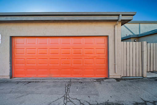 A garage door is open.