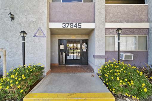The image shows the front of a building with the number 37945 on it.