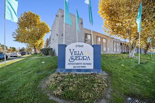 Villa Sterpa apartment complex with a sign in front.