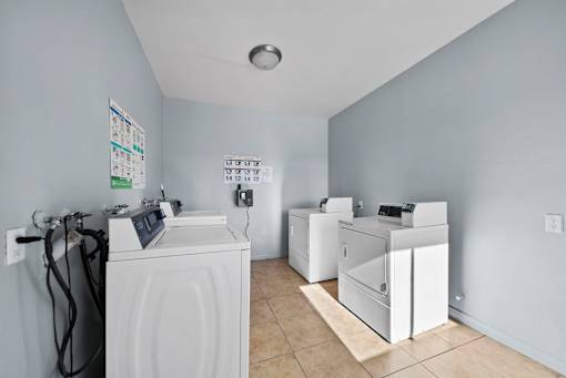 A laundry room with a washer and dryer.