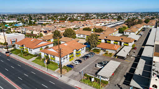 A residential area with houses and a road.