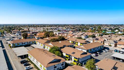 A view of a residential area with houses and buildings.