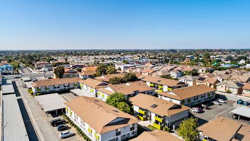 A view of a residential area with houses and buildings.