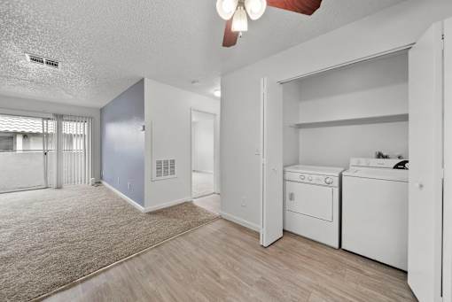 A laundry room with a washer and dryer.
