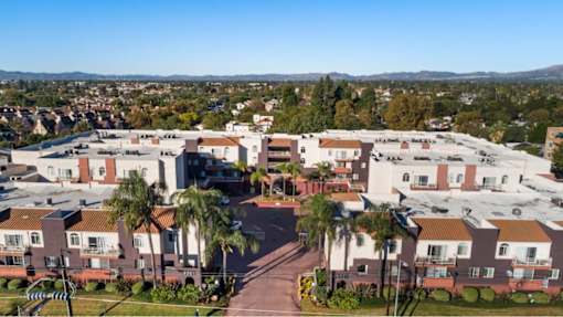 A large apartment complex with a courtyard in the middle.