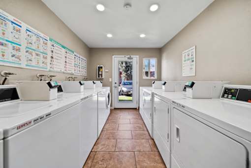 A laundromat with Wash Wash Wash 240 machines.