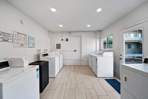 A laundry room with a washer and dryer.