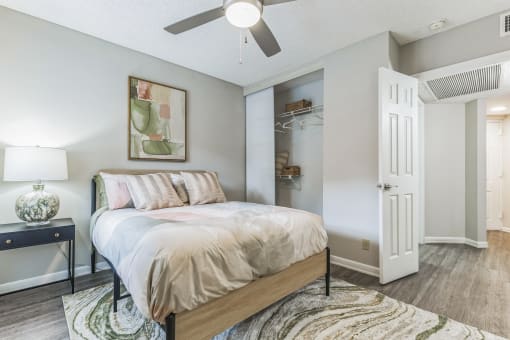 Bedroom with a bed and a ceiling fan at The Atlantic Preserve, Plantation, FL 33322