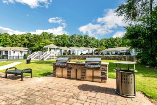 Grill in the backyard at The Atlantic North Springs, Dunwoody, GA, 30350