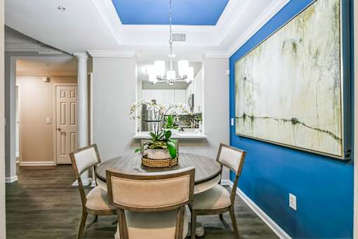 A dining room with a table and chairs at The Atlantic Buckhead Apartments, Atlanta, Georgia