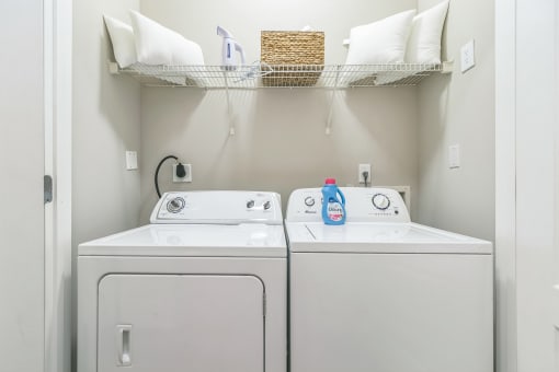 White washer and dryer laundry room at The Atlantic North Highland, Charlotte