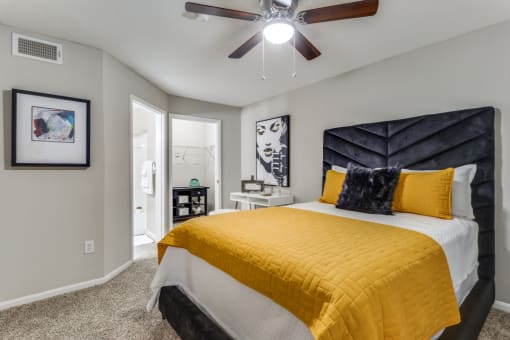 Bedroom with cozy bed at The Atlantic Grand Oaks, Austin