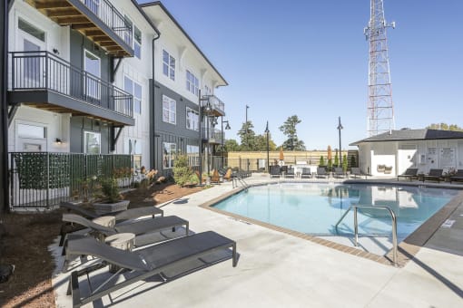 Pool with lounge area at Arcadia Decatur, Decatur, GA