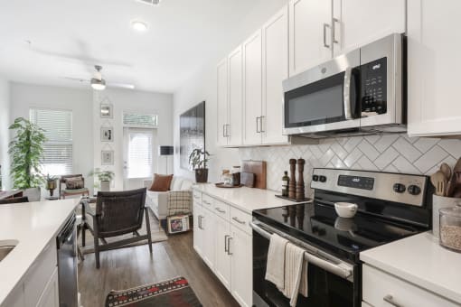 Open kitchen and living room at Arcadia Decatur, Decatur, GA, 30030.