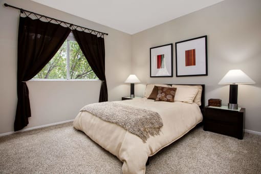Bedroom with large window at The Barrington Club, Coral Springs, FL