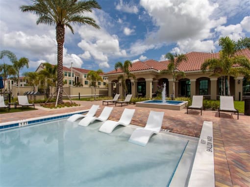 Resort-Inspired Beach Entry Pool with Sundeck. at The Atlantic Palms at Tradition, Port St Lucie, FL