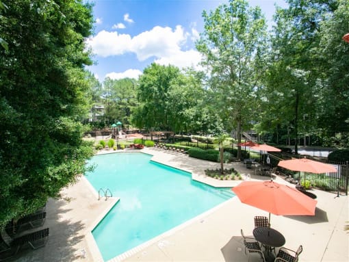 Sparkling Swimming Pool with Sundeck.