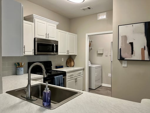 Model. Kitchen and Laundry Room.