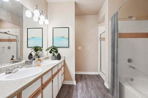 A bathroom with a white sink and a large mirror at Reserve at Canyon Creek,Texas,78230