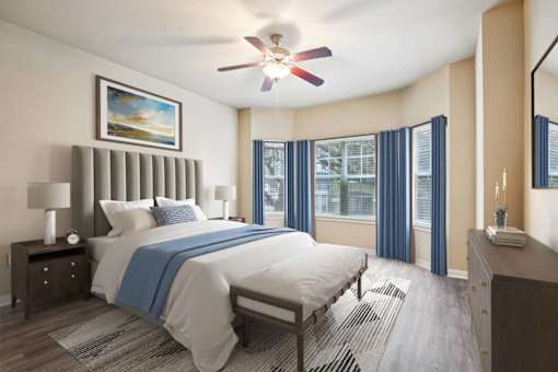 A bedroom with a large bed and a ceiling fan at Reserve at Canyon Creek,San Antonio,TX