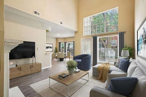 Classic Living Room Design With Television at Reserve at Canyon Creek, Texas, 78230