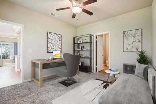 Work space with table, chair and sofa at Reserve at Reserve at Canyon Creek, San Antonio, Texas