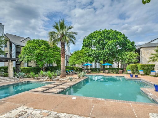 Sparkling Pool with Sundeck at Logans Mill, Austin, Texas.