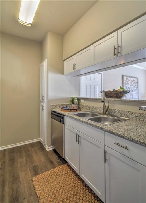 Kitchen with cabinets at The Atlantic Mansfield, Mansfield, TX