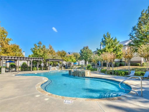 Resort-Inspired Pool with Waterfall. at The Atlantic Mansfield, Mansfield, TX