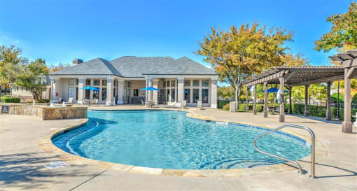 Resort-Inspired Pool with Waterfall. at The Atlantic Mansfield, Mansfield, TX, 76063