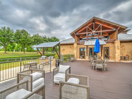 patio furniture at Village of Hawks Creek Apartments, Westworth Village, TX