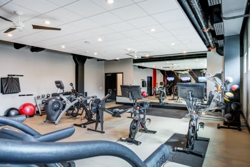 Apartments for Rent in Kalamazoo, MI - 400 Rose - Fitness Center with Stationary Bikes and Free Weights