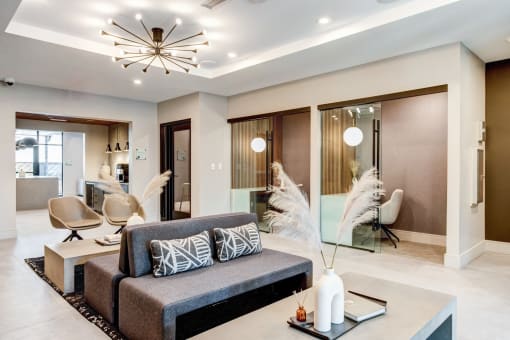 a living room with a couch and a table