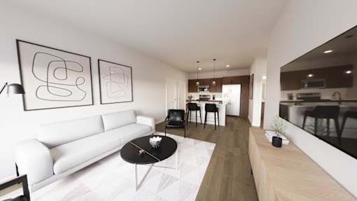 A modern living room with a white sofa and a black coffee table at Solhaven Grand Chute, Appleton, 54913