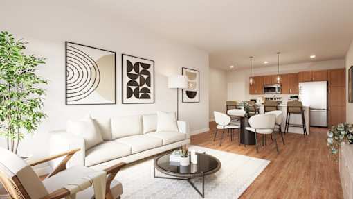 A modern living room with a white couch, wooden chairs, and a coffee table.at The Landing at Hub City, Plymouth, 53073
