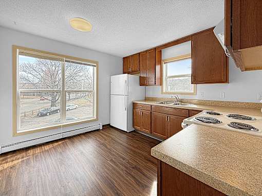 A Kitchen at 910 25th ave S with white appliances