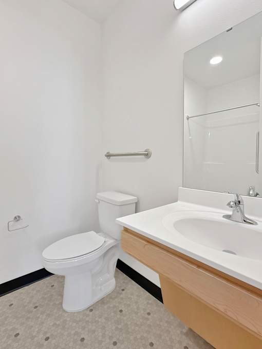 Another toilet and vanity at Stryker Senior Apartments in West St. Paul 