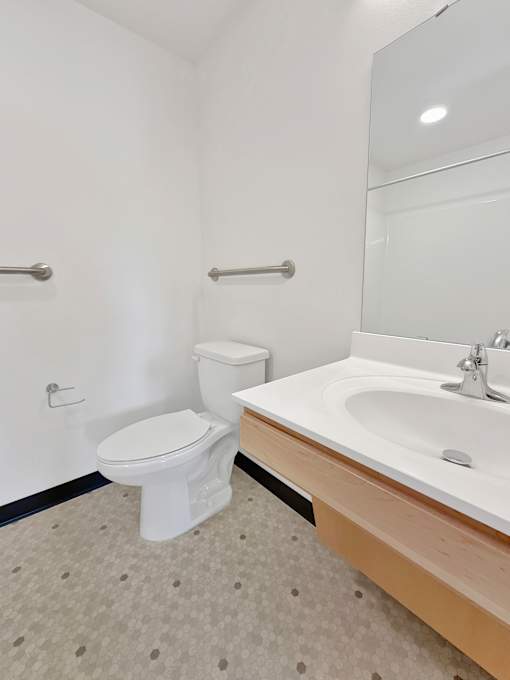A photo of a toilet and vanity at Stryker Senior Apartments in West St. Paul 