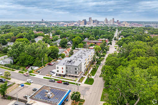 an aerial view of Stryker Senior Apartments with a city in the background