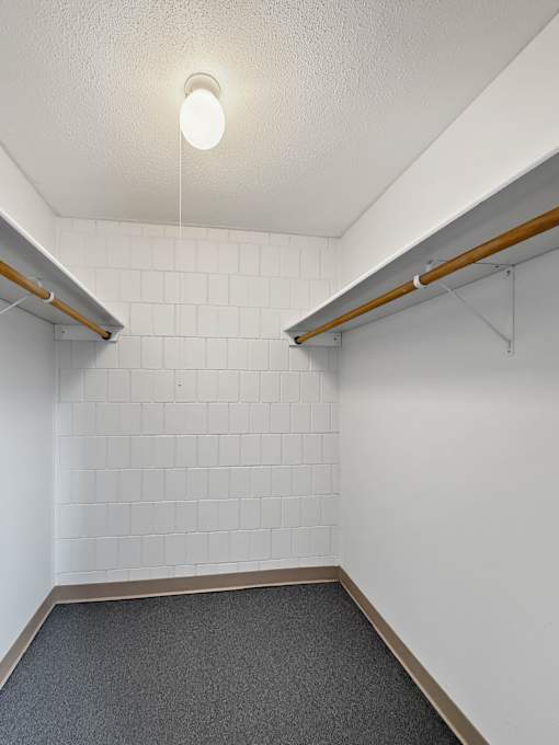 A walk-in closet at Liberty Plaza