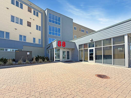 The number 88 is displayed on the front of a building.