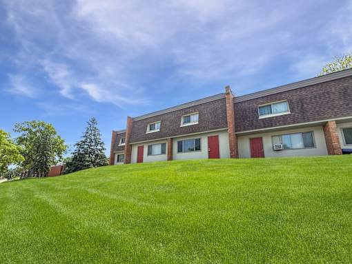 A photo of the front lawn of  Liberty Plaza Townhomes