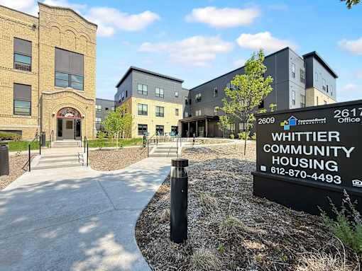 The exterior and front sign at Whittier Community Housing