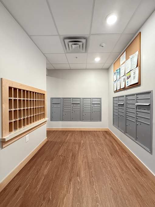 a small room with mailboxes and cubbies